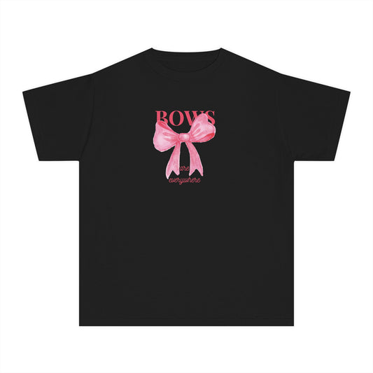 Girls’ black casual t-shirt with all-over pink bows and standout center bow – cute kids’ tee by Fibrio