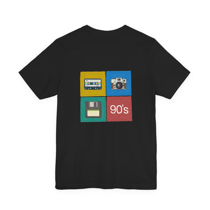 Black t-shirt with '90s' design featuring a camera, cassette, and floppy disk by Fibrio
