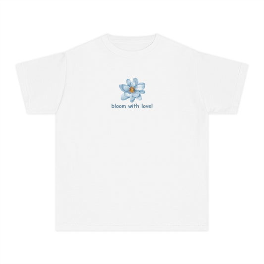 Girls’ white casual t-shirt with Bloom with Love text and vibrant flower graphic – playful kids’ tee by Fibrio